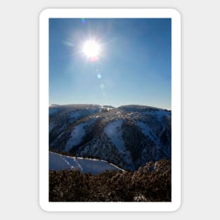 Sun on the mountainside in winter Sticker
